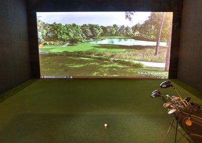 Commercial lighting and equipment installation for an indoor golf driving course